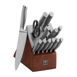 Henckels International makes essential kitchen tools that every home chef needs. Created in 1895, this time-honored brand offers high quality at an exceptional value. Sharpness is always in reach with Henckels International Self-Sharpening Modernist Knife Blocks. The self-sharpening slots boast built-in ceramic honing wheels that automatically sharpen when knives are stored or removed. The remaining slots are for serrated knives, whose toothed blades never need sharpening. With these must-have knife blocks, enjoy effortless sharpness for precise prep work every time. Plus, their handsome stained ash wood base and stainless steel cap add aesthetic appeal to your countertop. Tailor-made for J.A. Henckels International Modernist knives, these blocks help you maintain the superior sharpness of their fine edge, precision-honed blades. With a seamless transition from blade to handle, the knives' fully forged construction provides balance while their traditional triple-rivet handle encourages tireless cutting. Set includes: 3 in. Paring Knife; 5 in. Serrated Utility Knife; 6 in. Utility Knife; 7 in. Santoku Knife; 8 in. Bread Knife; 8 in. Chef's Knife; 4.5 in. Steak Knives (6); Kitchen Shears; Self-Sharpening Knife Block Stylish brushed stainless steel cap and stained ash wood base self-sharpening block Tailor-made for the J.A. Henckels International Modernist knife series Self-sharpening slots that sharpen each time a knife is removed or replaced Labeled slots guide proper placement Knives made of high-quality German stainless steel Lightweight, ergonomic, stainless steel handle