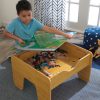 KidKraft Reversible Wooden Activity Table with Board and Train Set, Natural